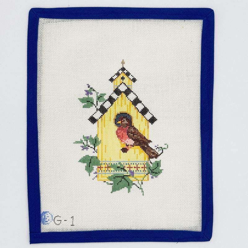 Yellow Birdhouse With Bird