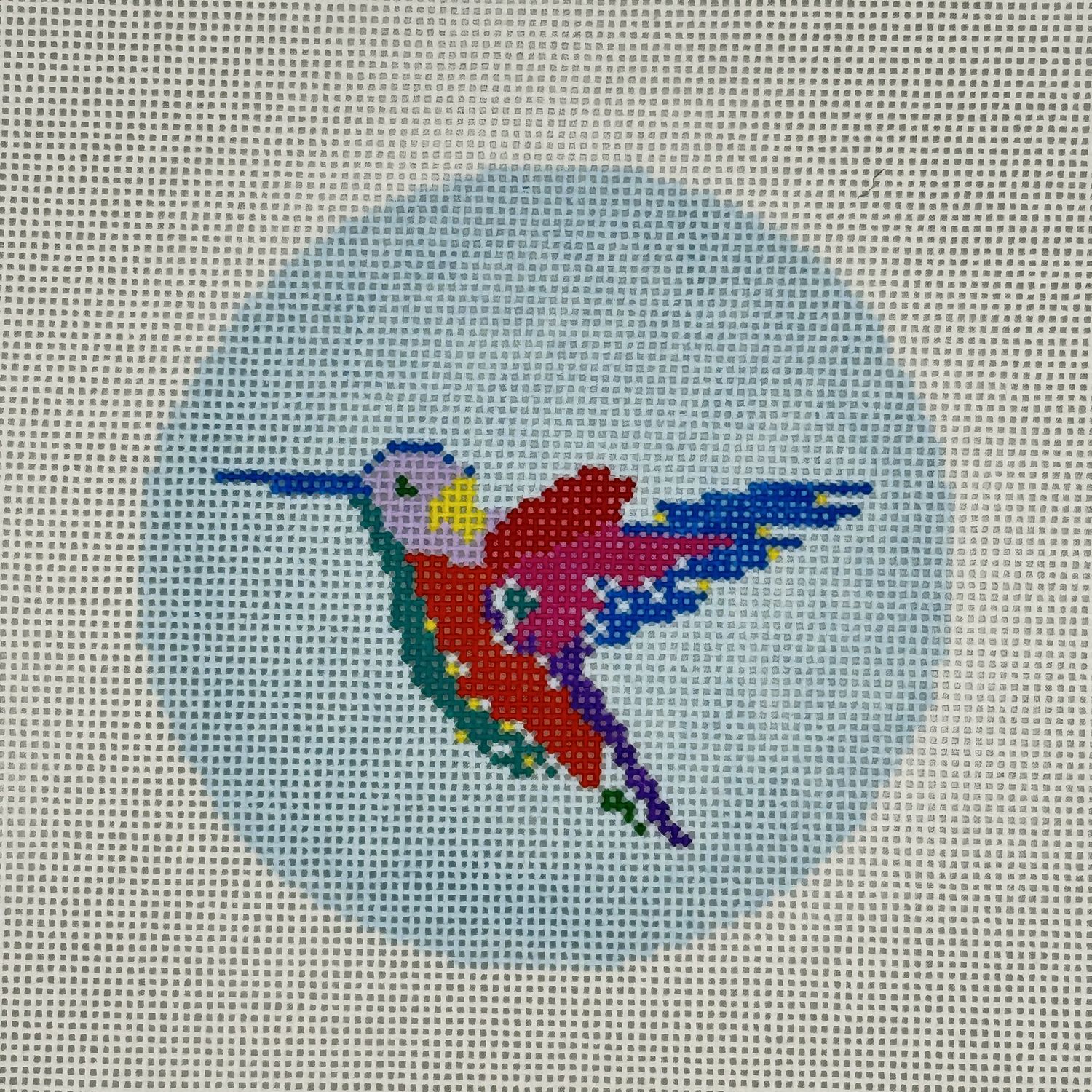 Hummingbird on Blue