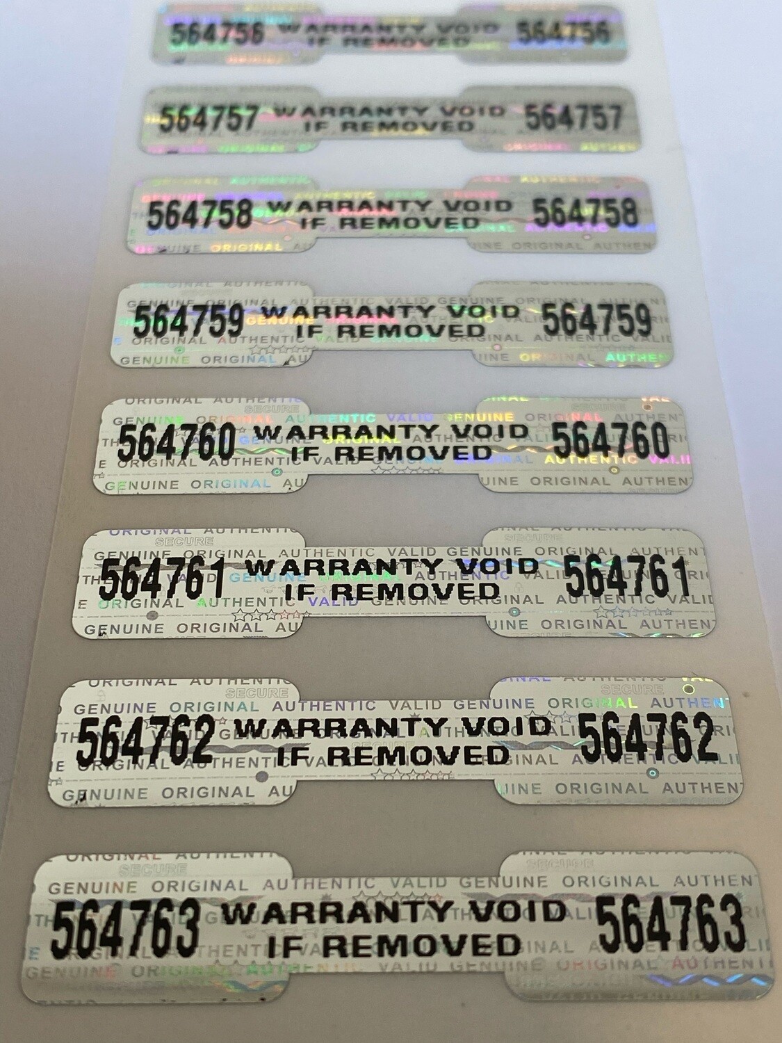 1.75 X .35 Inch Bright Silver Tamper Evident Hologram Dogbone Label