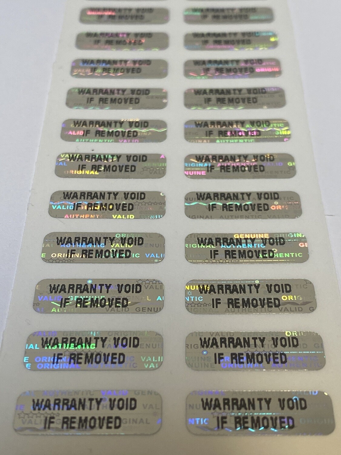 .75 X .25 Inch Bright Silver Warranty Void If Removed Hologram