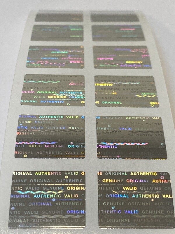 .75 X .60 Inch bright silver tamper evident hologram label