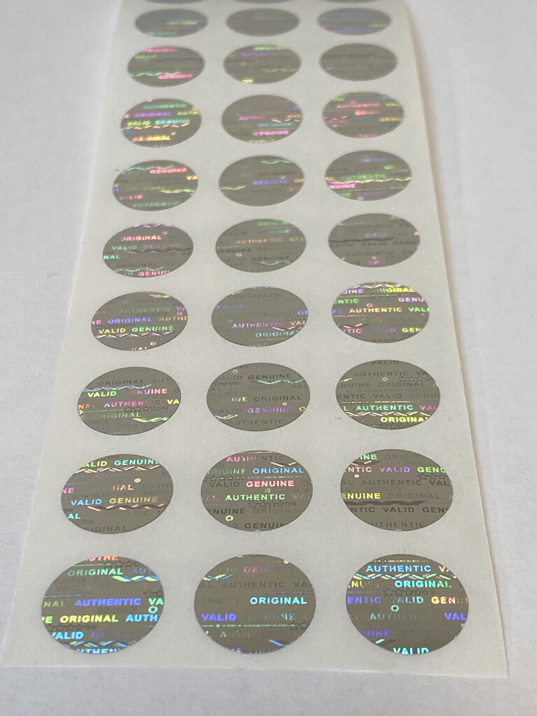 .50 inch round bright silver tamper evident hologram label