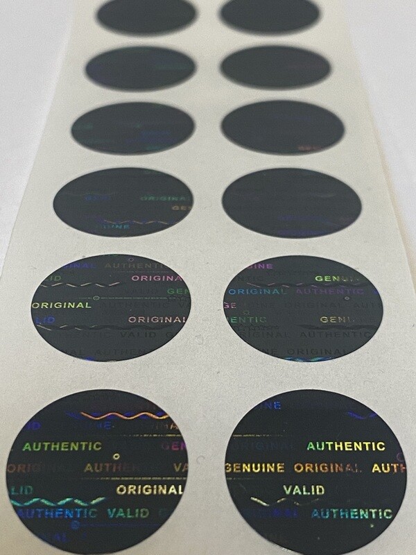 .625 inch round black tinted tamper evident hologram label