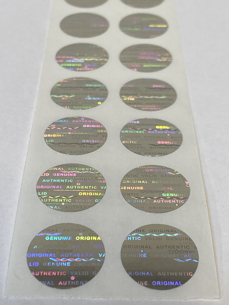 .625 inch round bright silver tamper evident hologram label