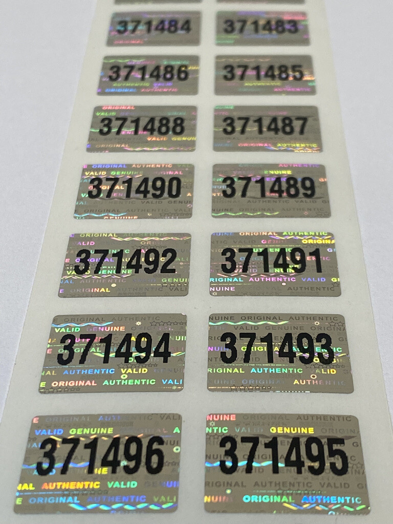 .75 X .60 Numbered Bright Silver Tamper Evident Hologram Label