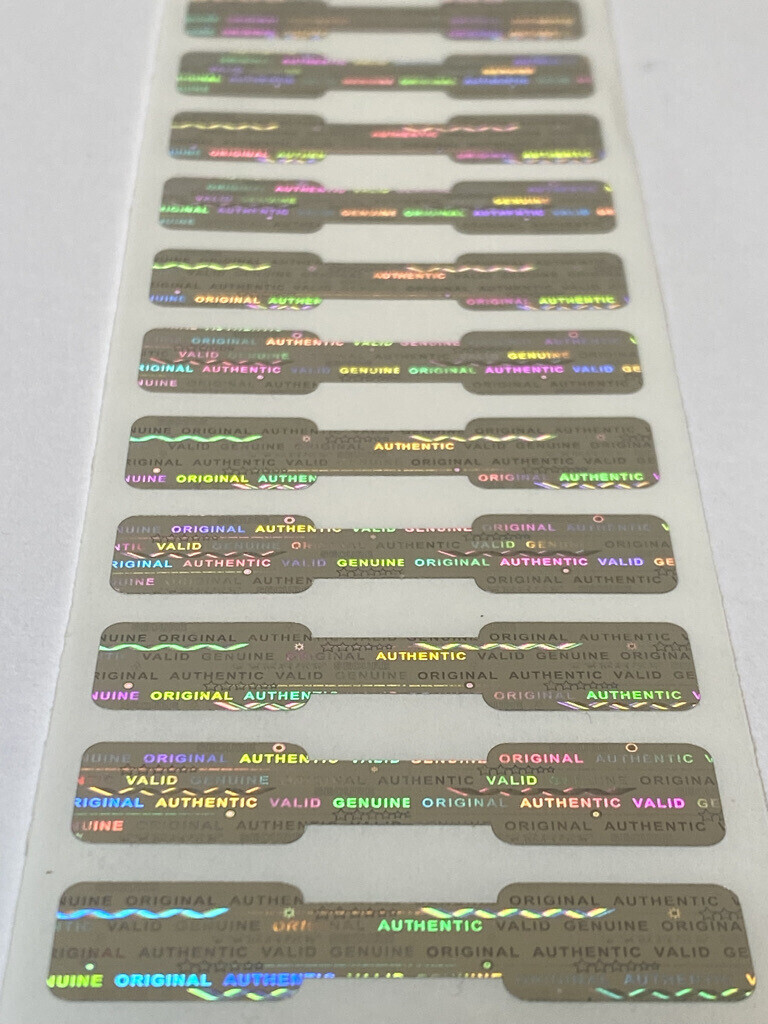 1.75 X .35 Inch Bright Silver Tamper Evident Hologram Dogbone Label