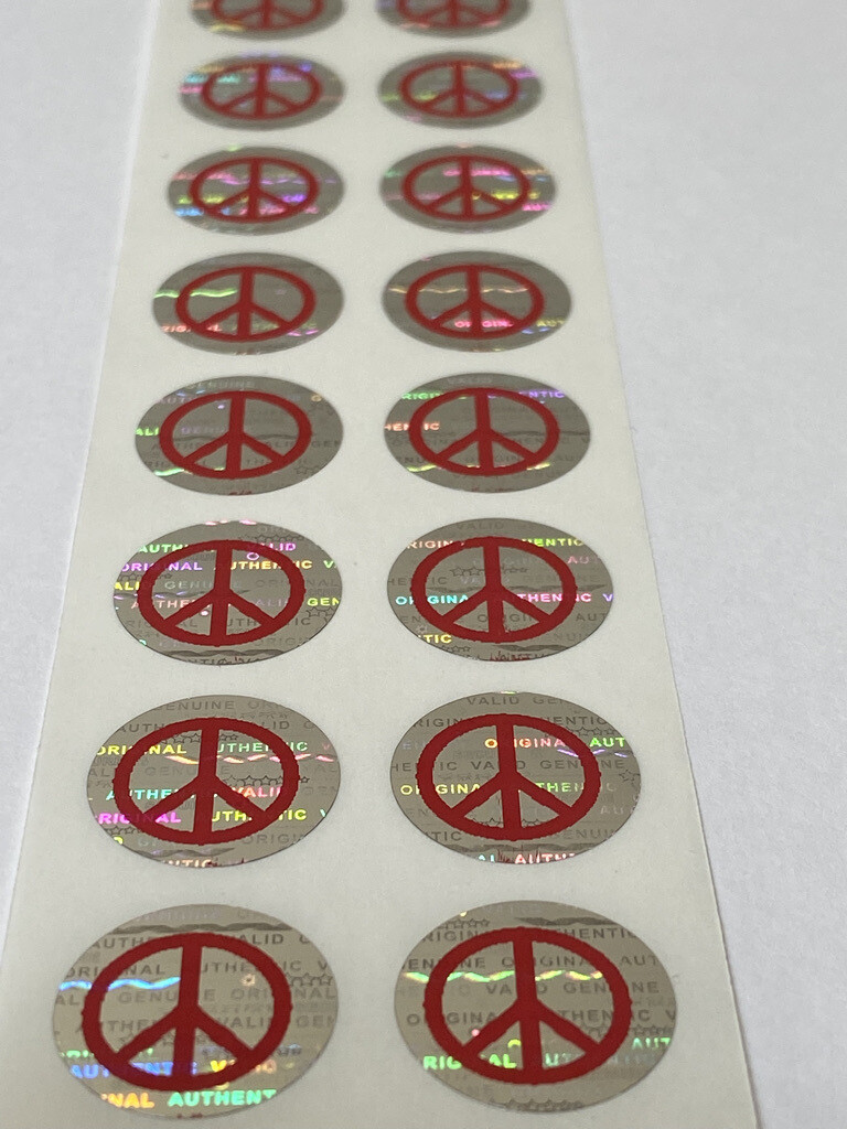 .625 inch round tamper evident hologram label w/ peace sign