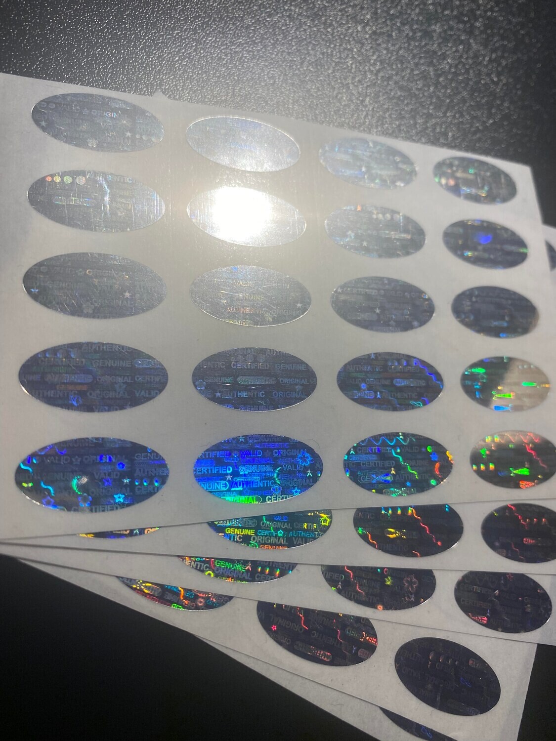 [QTY 100] .75 X .35 Inch Bright Silver Oval Tamper Evident Labels