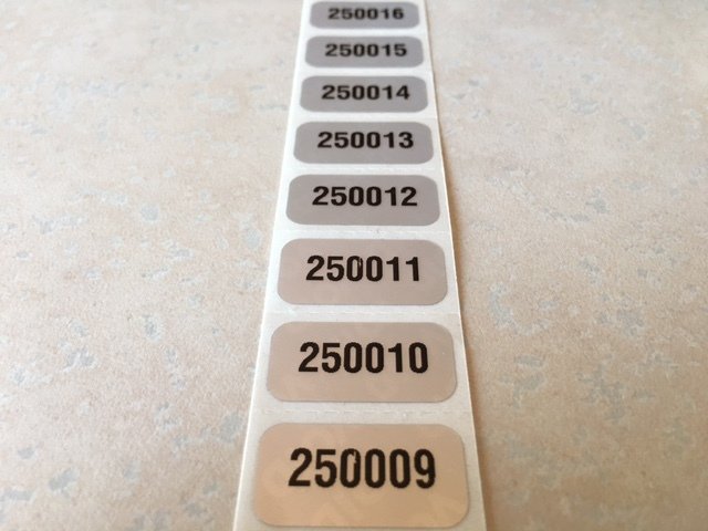 1 Inch X .50 inch Numbered Matte Silver Tamper Evident Label