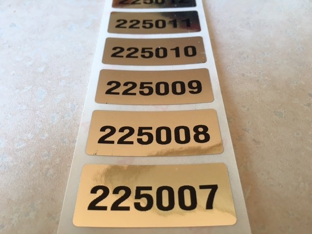 1.75  X .75 inch Numbered Chrome Bright Silver Tamper Evident Label
