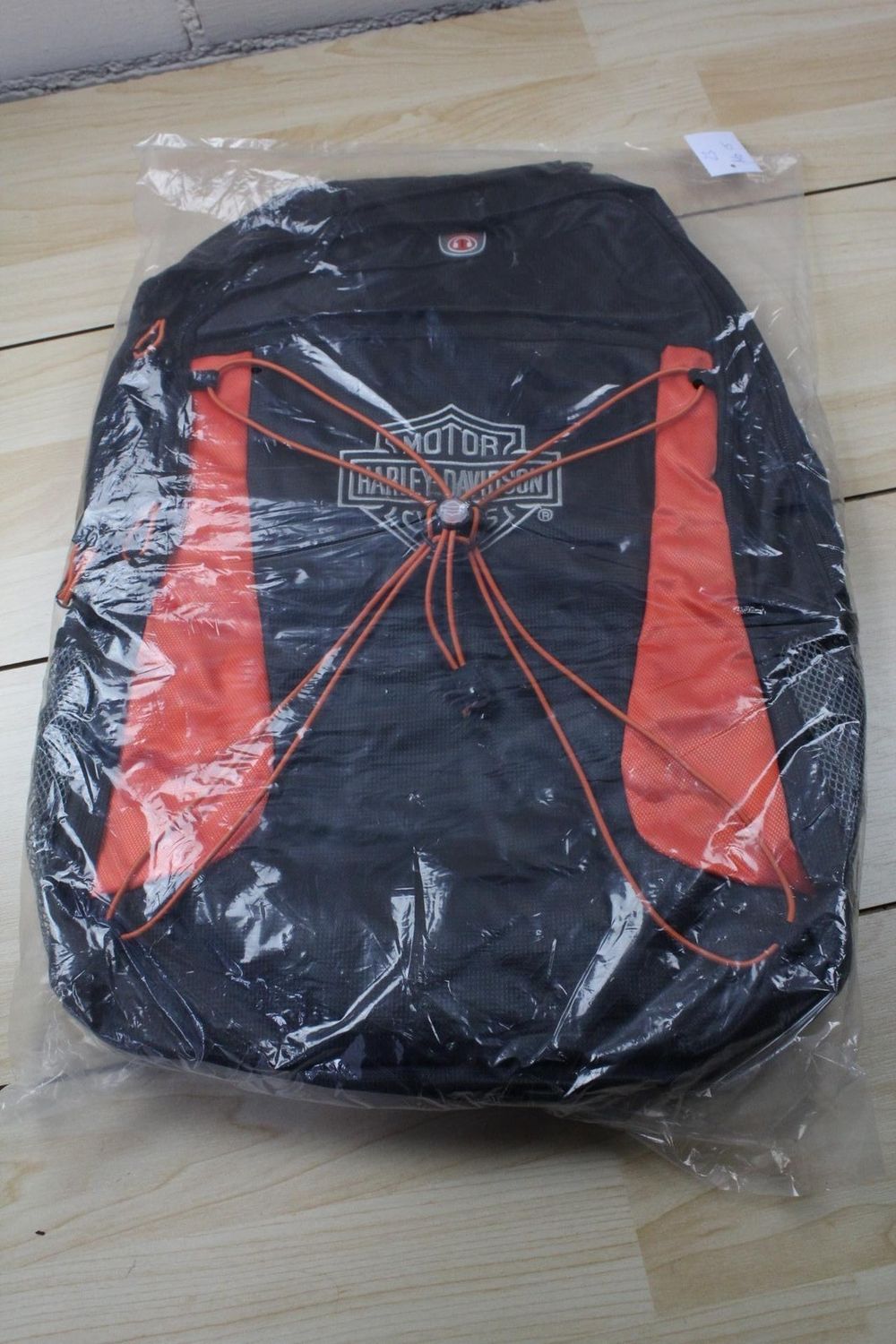 Harley-Davidson Rucksack Motorrad Backpack mit Regenhülle Schwarz Orange Top Zus