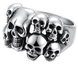 R102 Multi-Skull Face Ring