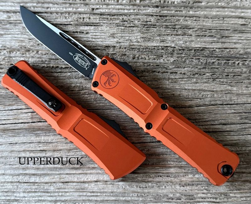 Microtech Combat Troodon GEN III OTF – Black Standard Edge Blade, Orange Aluminum Handle (1143-1OR)