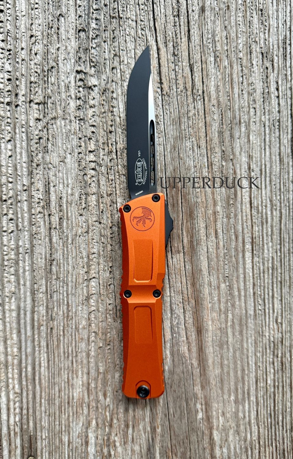 Microtech Combat Troodon GEN III OTF – Black Standard Edge Blade, Orange Aluminum Handle (1143-1OR)