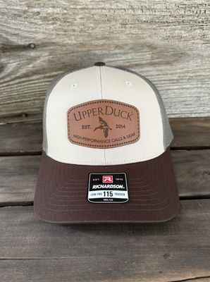UPPERDUCK 10 Year Structured #115 Trucker Hat Muddy Mississippi® Tan and Mossy Mallard™