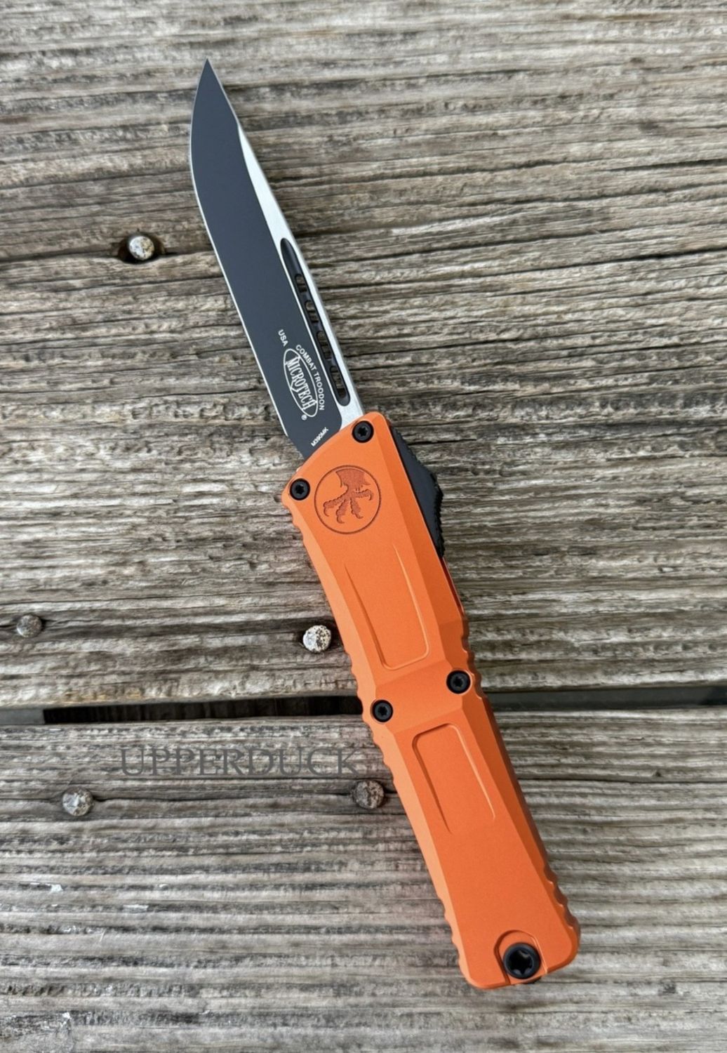 Microtech Combat Troodon GEN III OTF – Black Standard Edge Blade, Orange Aluminum Handle (1143-1OR)