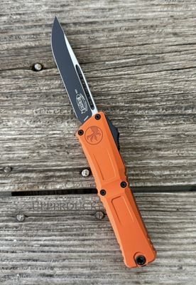 Microtech Combat Troodon GEN III OTF – Black Standard Edge Blade, Orange Aluminum Handle (1143-1OR)
