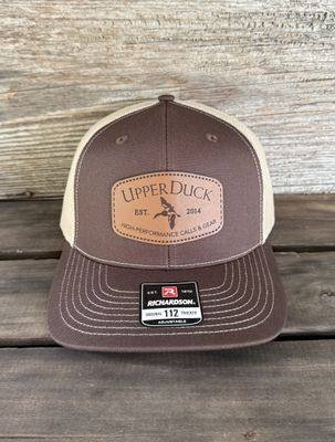 UPPERDUCK 10 Year Structured #112 Trucker Hat Muddy Mississippi® and Tan UPPERDUCK 10 Year Structured #112 Trucker Hat Muddy Mississippi® and Tan