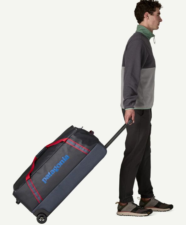 Black Hole Wheeled Duffel Smolder Blue/Red