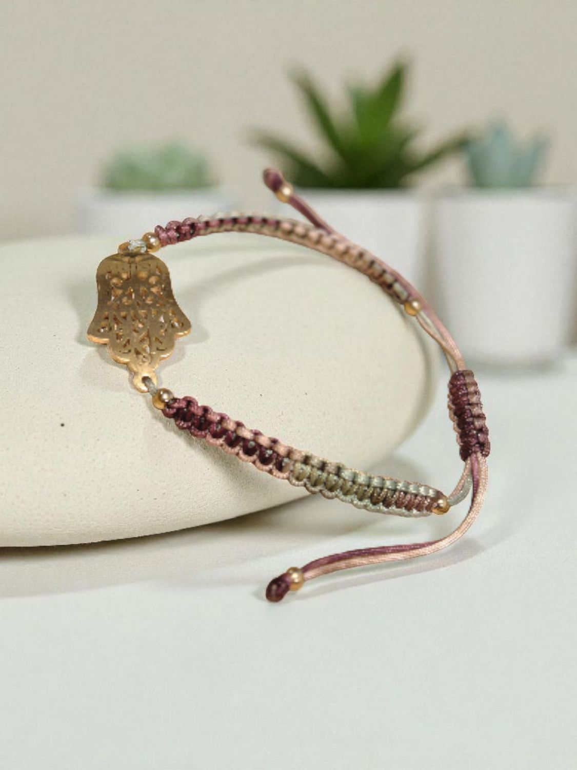 Bransoletka pleciona z łącznikiem hamsa