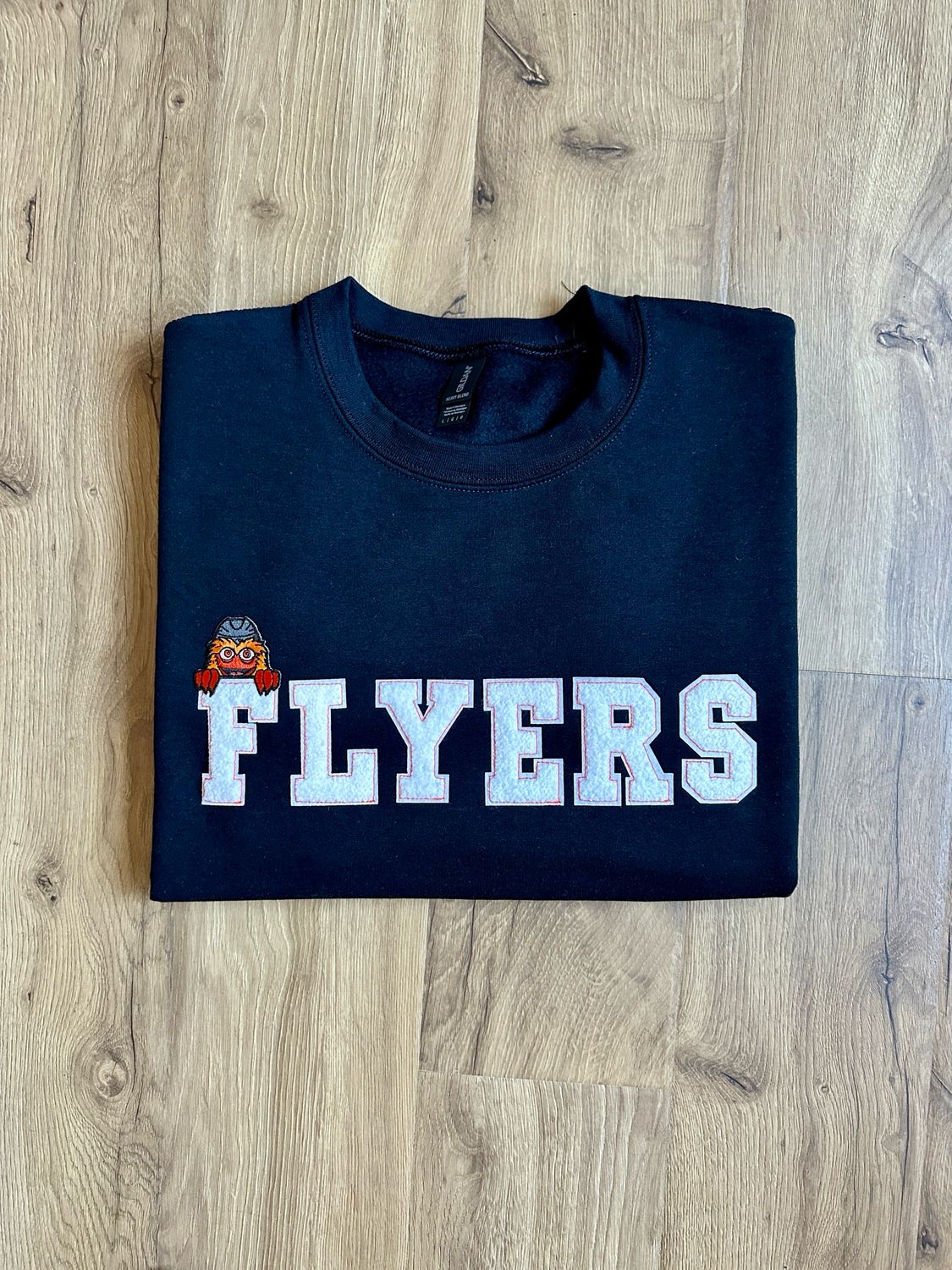Flyers Peeping Gritty Crewneck