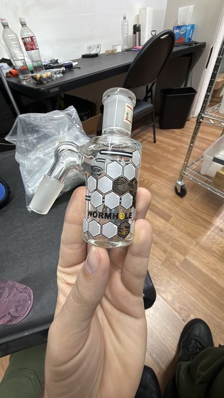 WORMHOLE ASH CATCHER