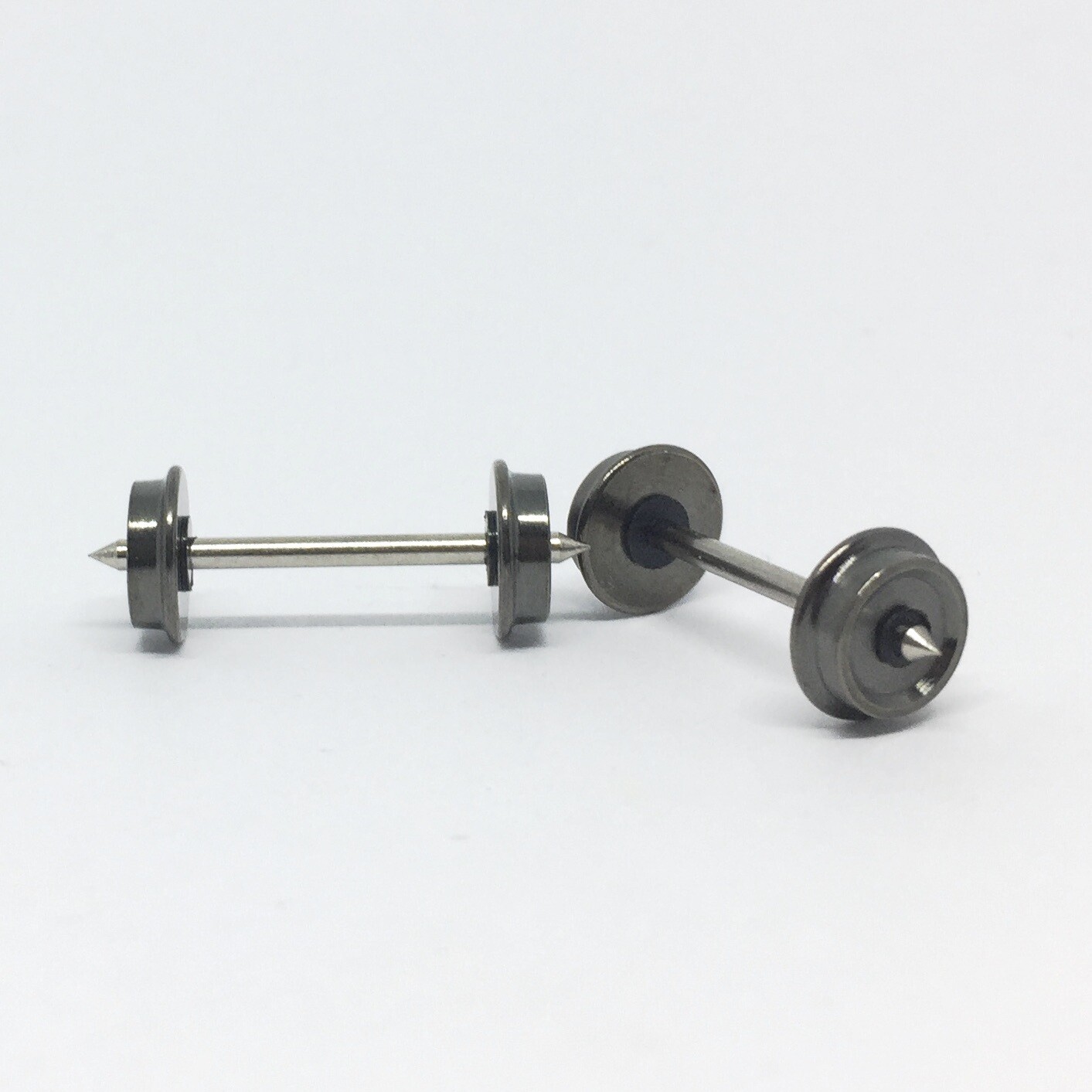 7mm Disc wheel set RP25 (2 axles) H0. Axle 1.5mm x 23.4mm. Both sides isolated