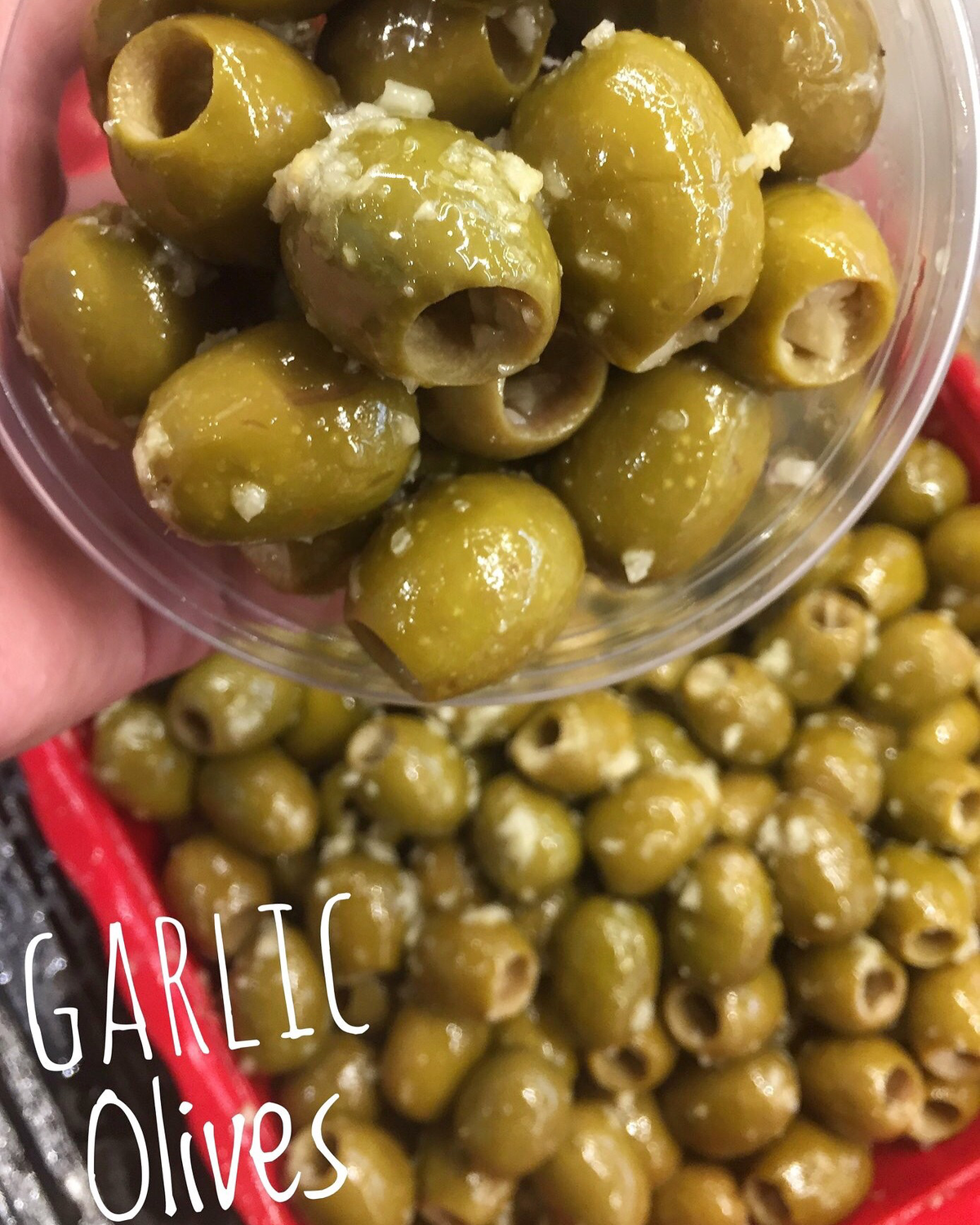 Garlic Pitted Green Olives - 1/2 Lb