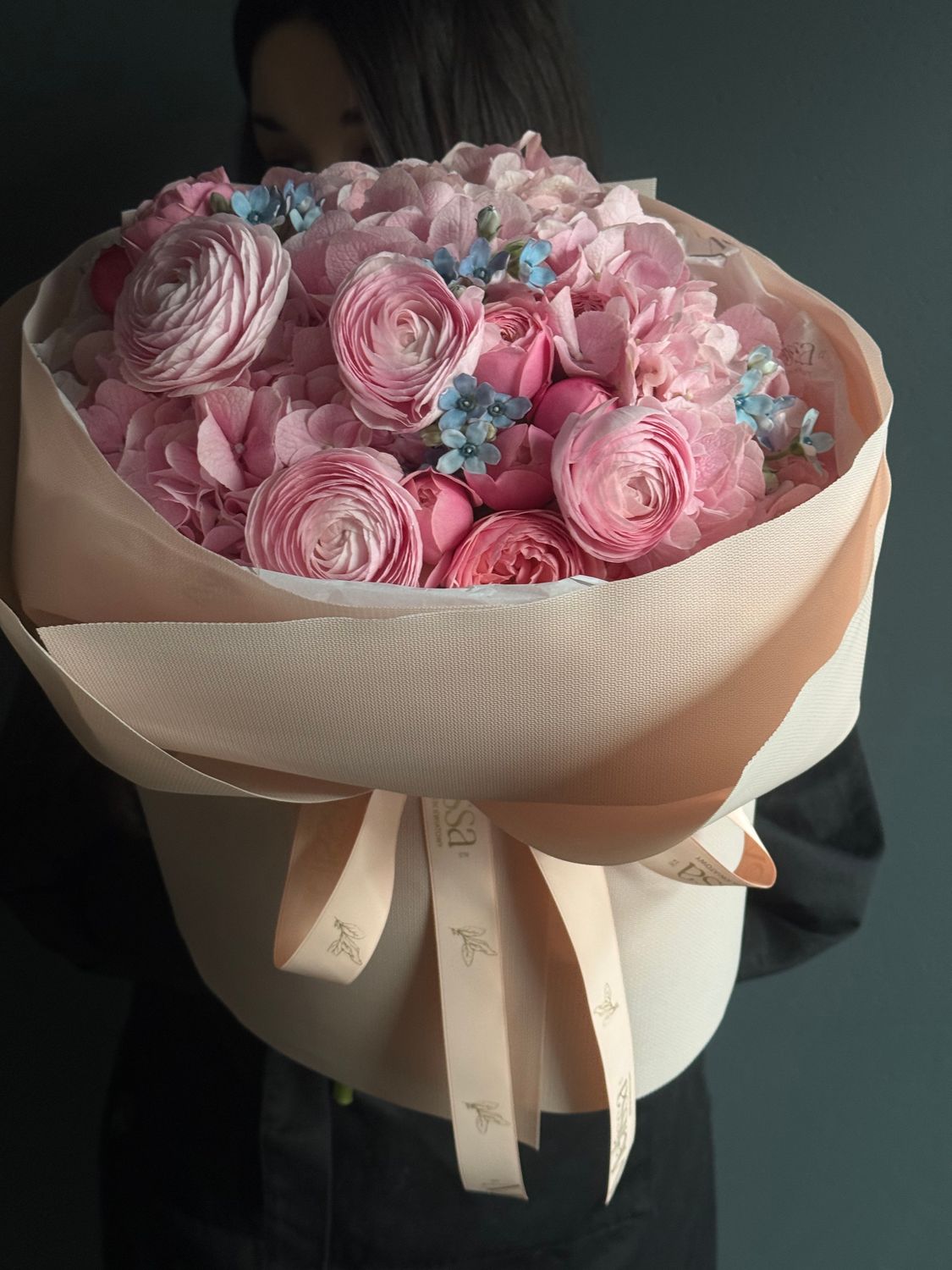 Bouquet with ranunculus, hydrangeas, roses, and blue accents «Carolina»