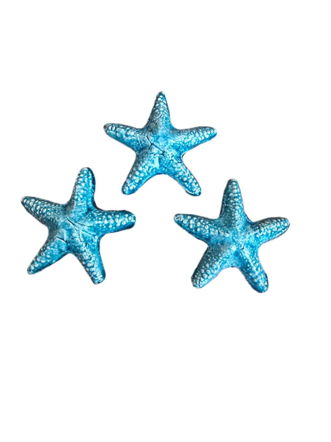 set of three starfish