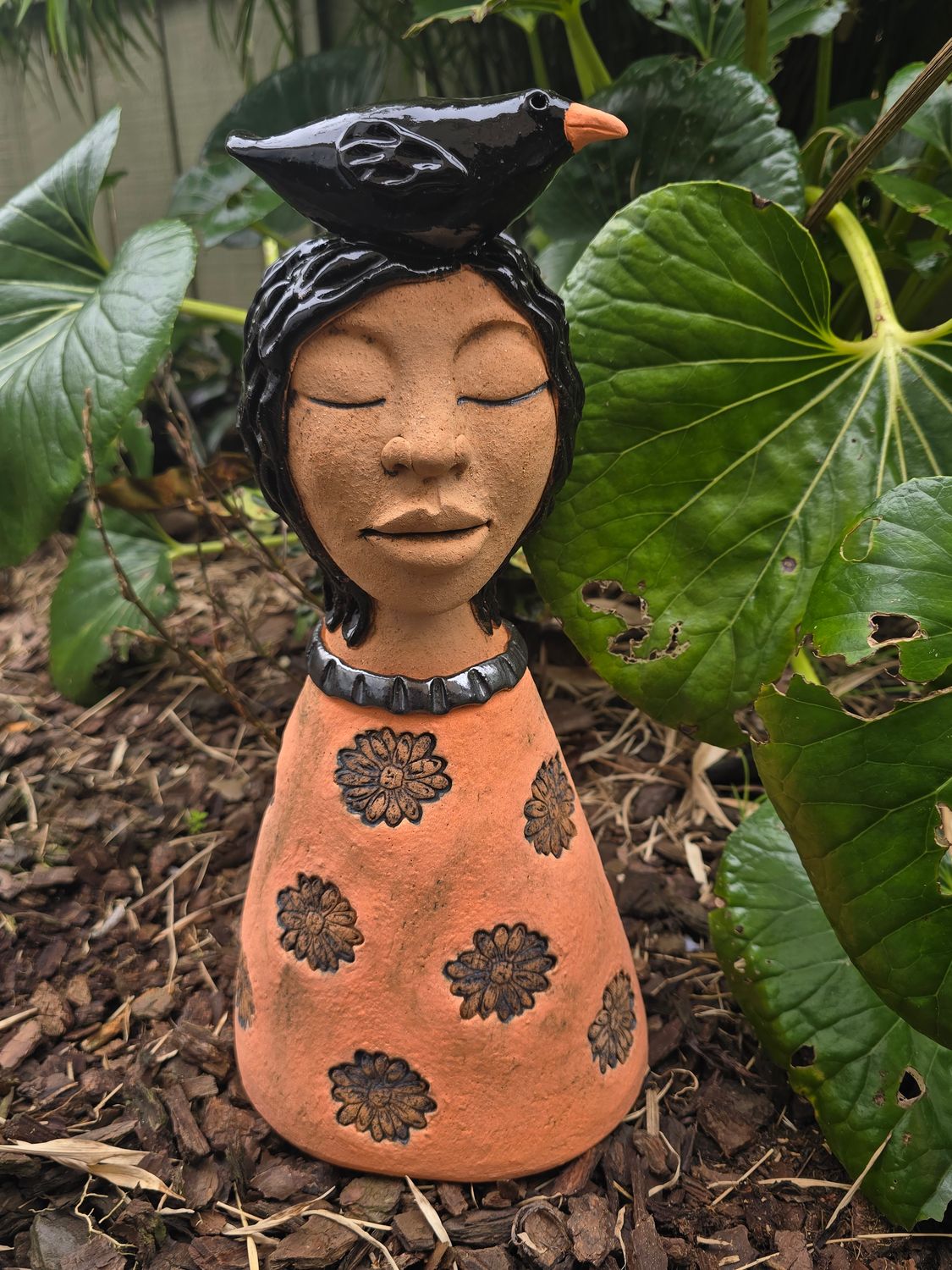 Lady in Orange dress with flowers and bird