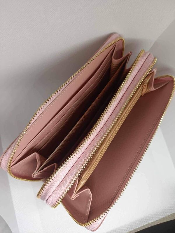 Portefeuille roze.
