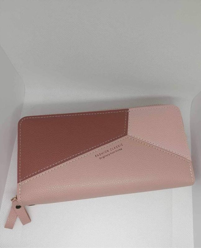Portefeuille roze.