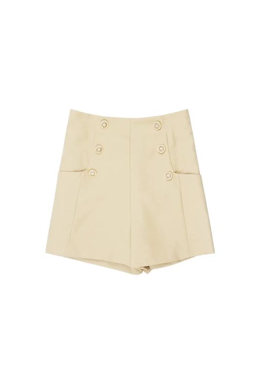Shorts met gouden knopen.