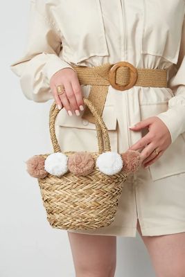 Strandtas met kleurrijke bolletjes.