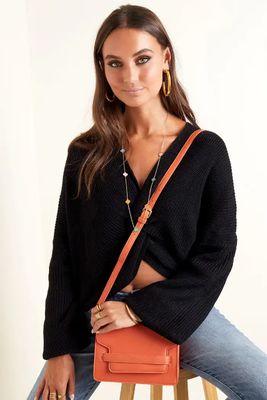 Vierkante PU lederen schouder tas met gesp sluiting.