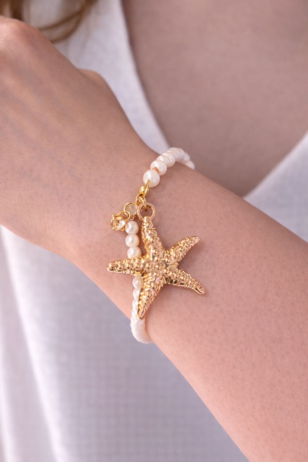 Armband parelkraaltjes.