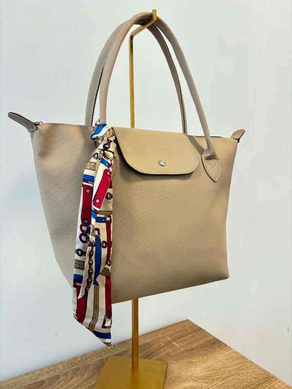 Handtas Beige.