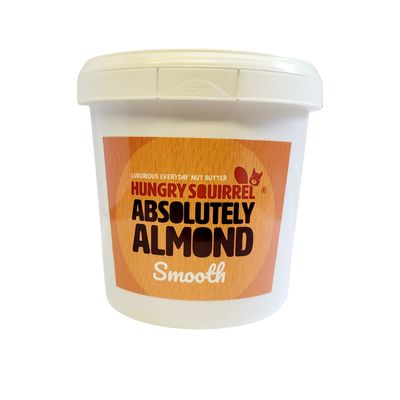 Absolutely Almond butter 1kg Front-facing view of 1kg Absolutely Almond Butter tub – BPA-free container with smooth almond butter label.