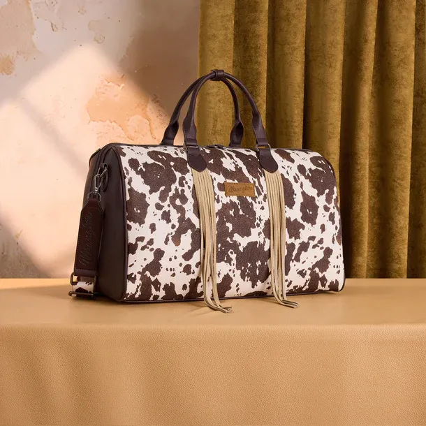 WRANGLER - Cow Print Fringe Duffle Bag