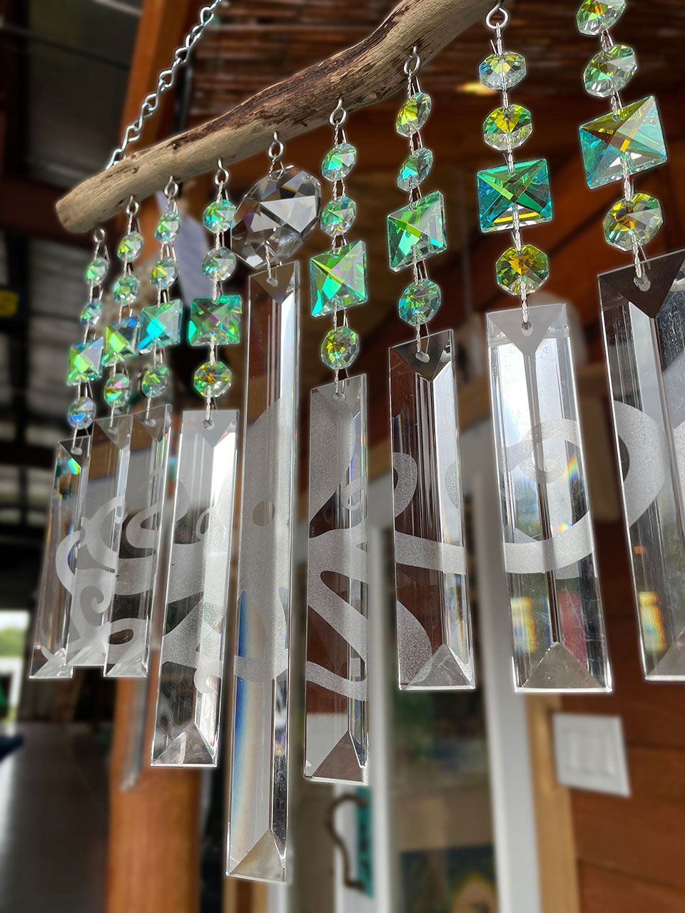 Natural Driftwood & Crystal Suncatcher Wind Chime 9 Strand With Octopus Etching Natural Driftwood & Crystal Suncatcher Wind Chime 9 Strand With Octopus Etching