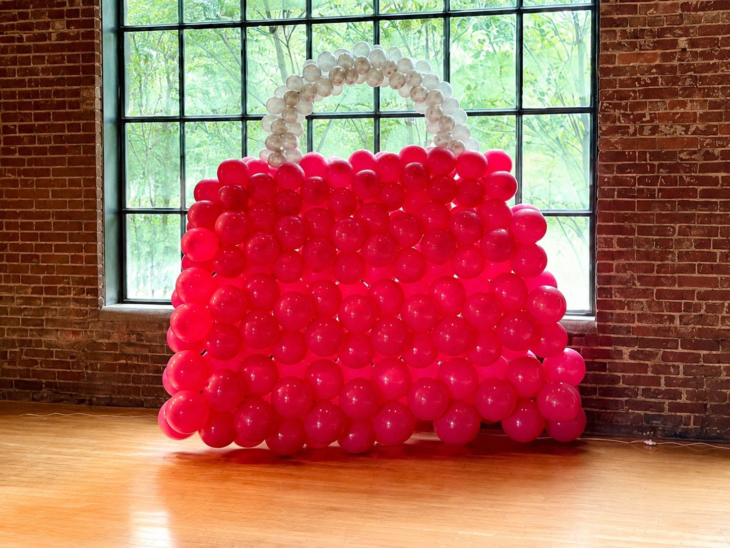 Purse balloon sculpture Purse balloon sculpture