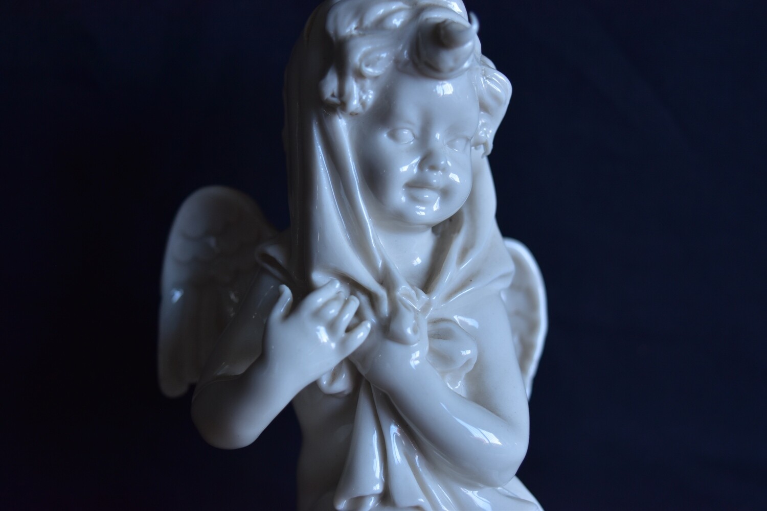 19th Century Porcelain Cherub Figurine