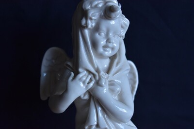 19th Century Porcelain Cherub Figurine