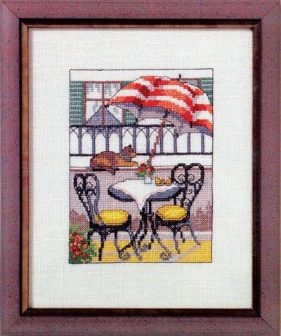 Cat at cafe table (Kat ved cafebord) by Oehlenschläger. Counted Cross Stitch kit
