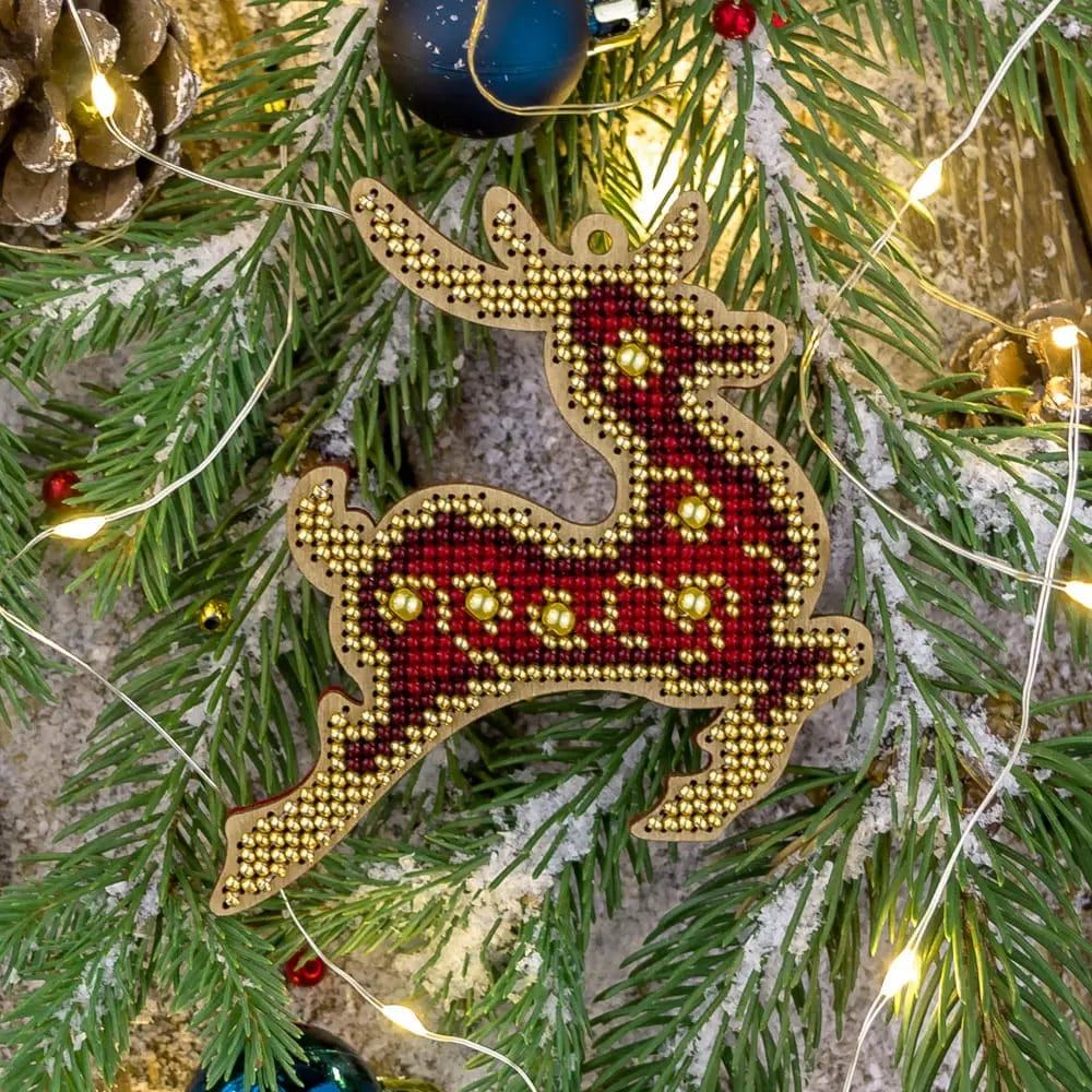 Reindeer with a red with gold ornament by Wonderland Crafts Christmas Tree toy Bead embroidery kit on wood