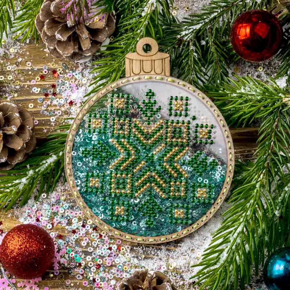 Green Christmas tree ball by Wonderland Crafts Christmas Bead embroidery kit on a plastic base