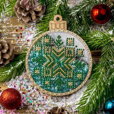 Green Christmas tree ball by Wonderland Crafts Christmas Bead embroidery kit on a plastic base