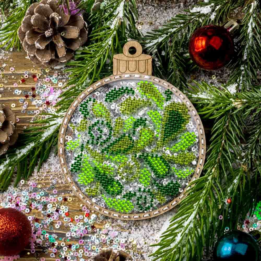 Green/Red Christmas tree ball by Wonderland Crafts Christmas Bead embroidery kit on a plastic base