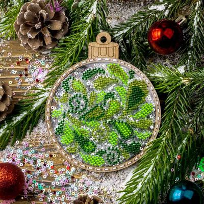 Green/Red Christmas tree ball by Wonderland Crafts Christmas Bead embroidery kit on a plastic base